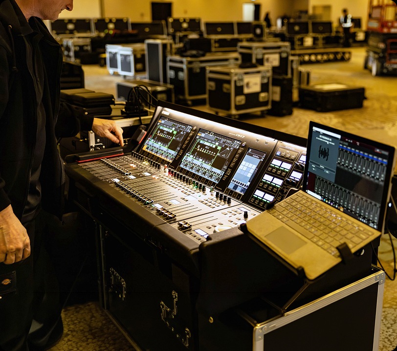 Technician checkign sound equipment