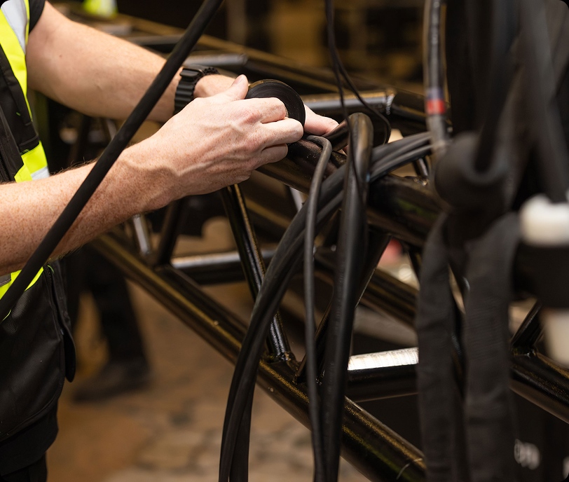Technician installing cables